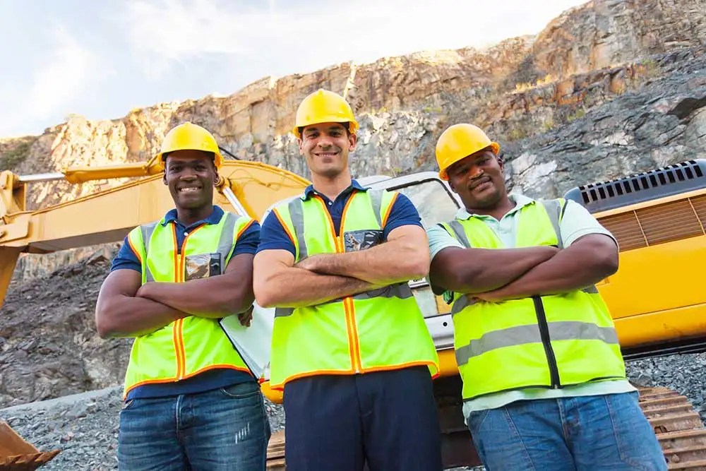 quarry workers standing next each other